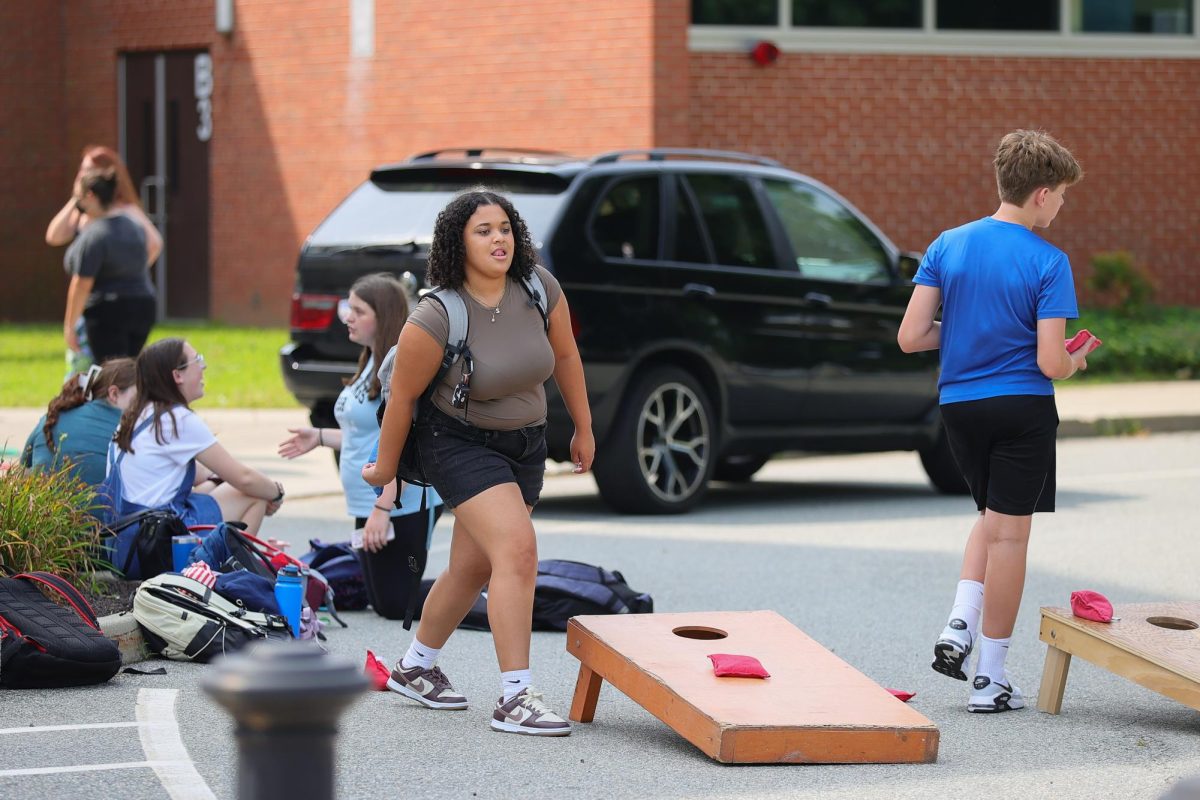 Samara Holley playing Bean Bag Toss.